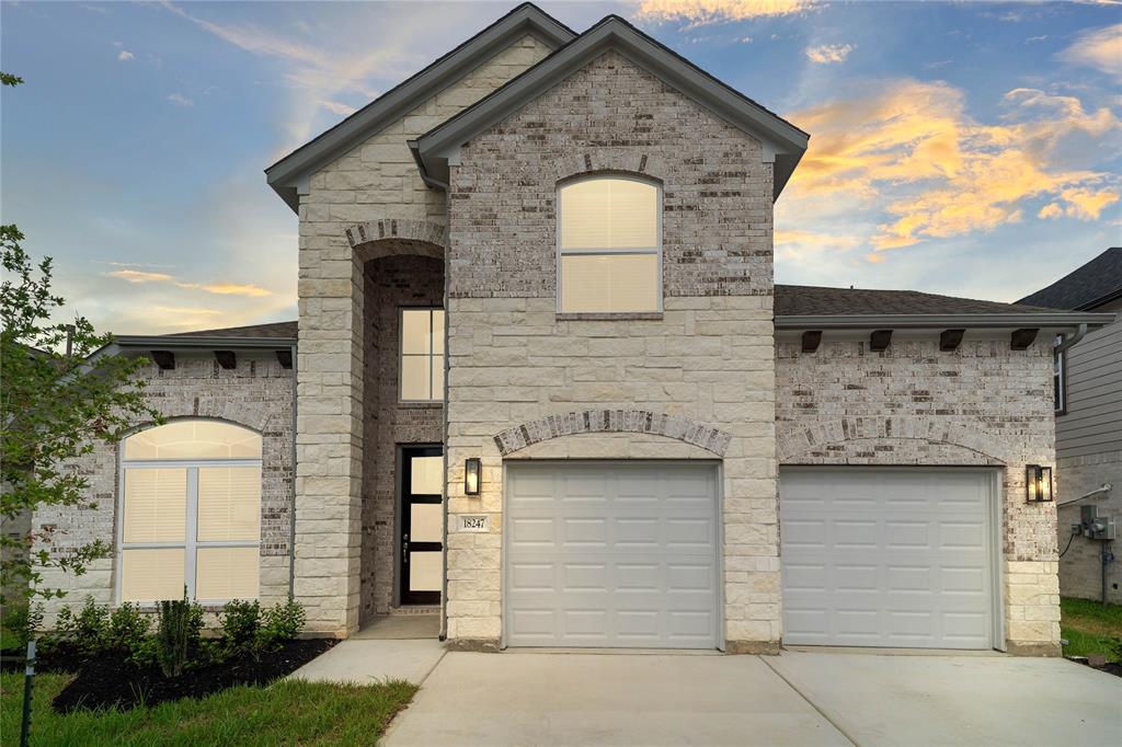 Welcome home to 18247 Windy Knoll Way located in Grand Oaks and zoned to Cypress-Fairbanks ISD.