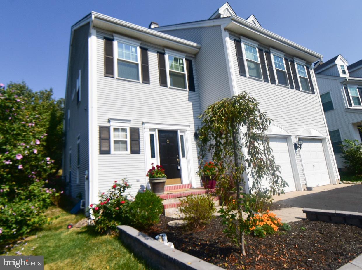 a front view of house with yard