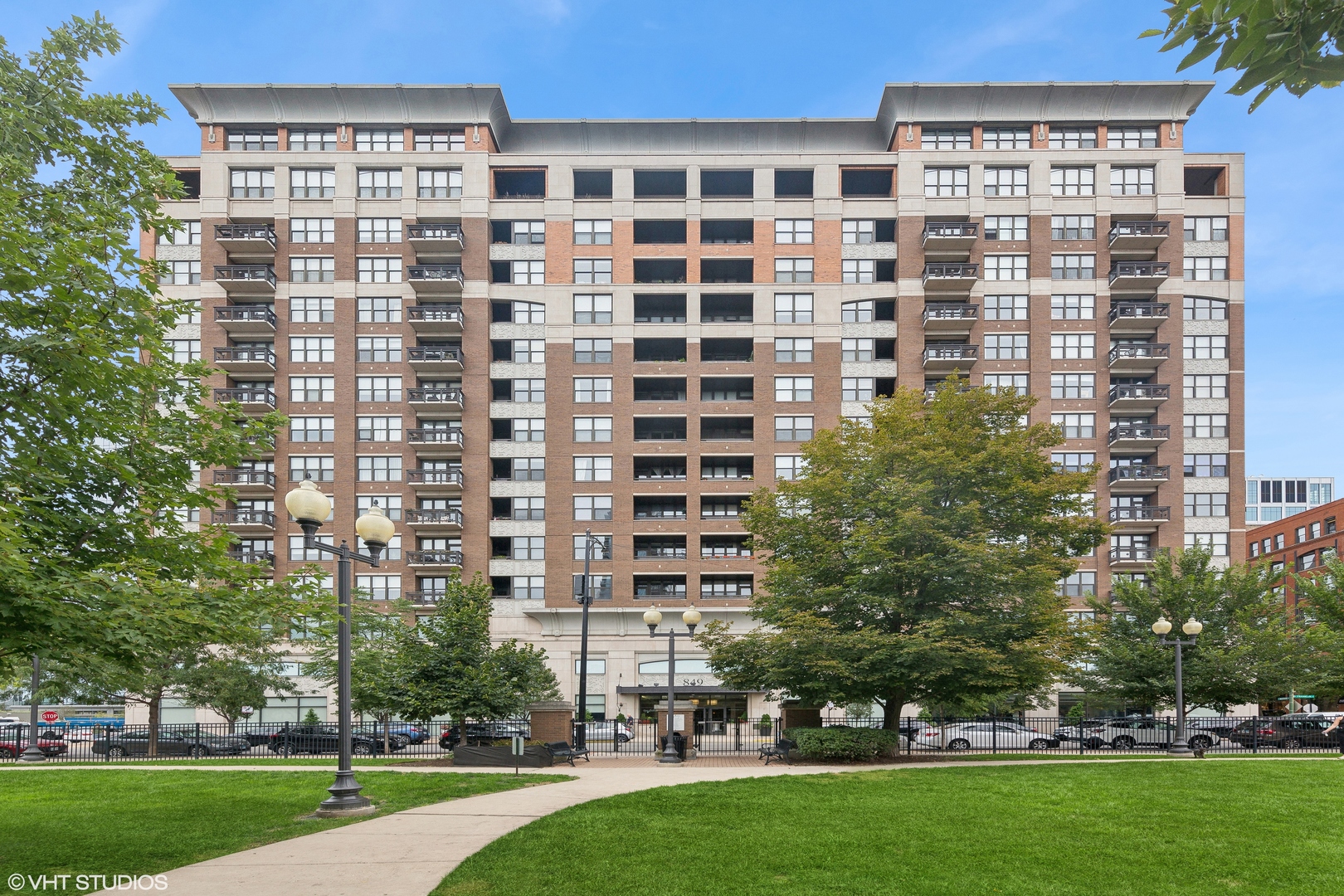 a view of a building with a yard