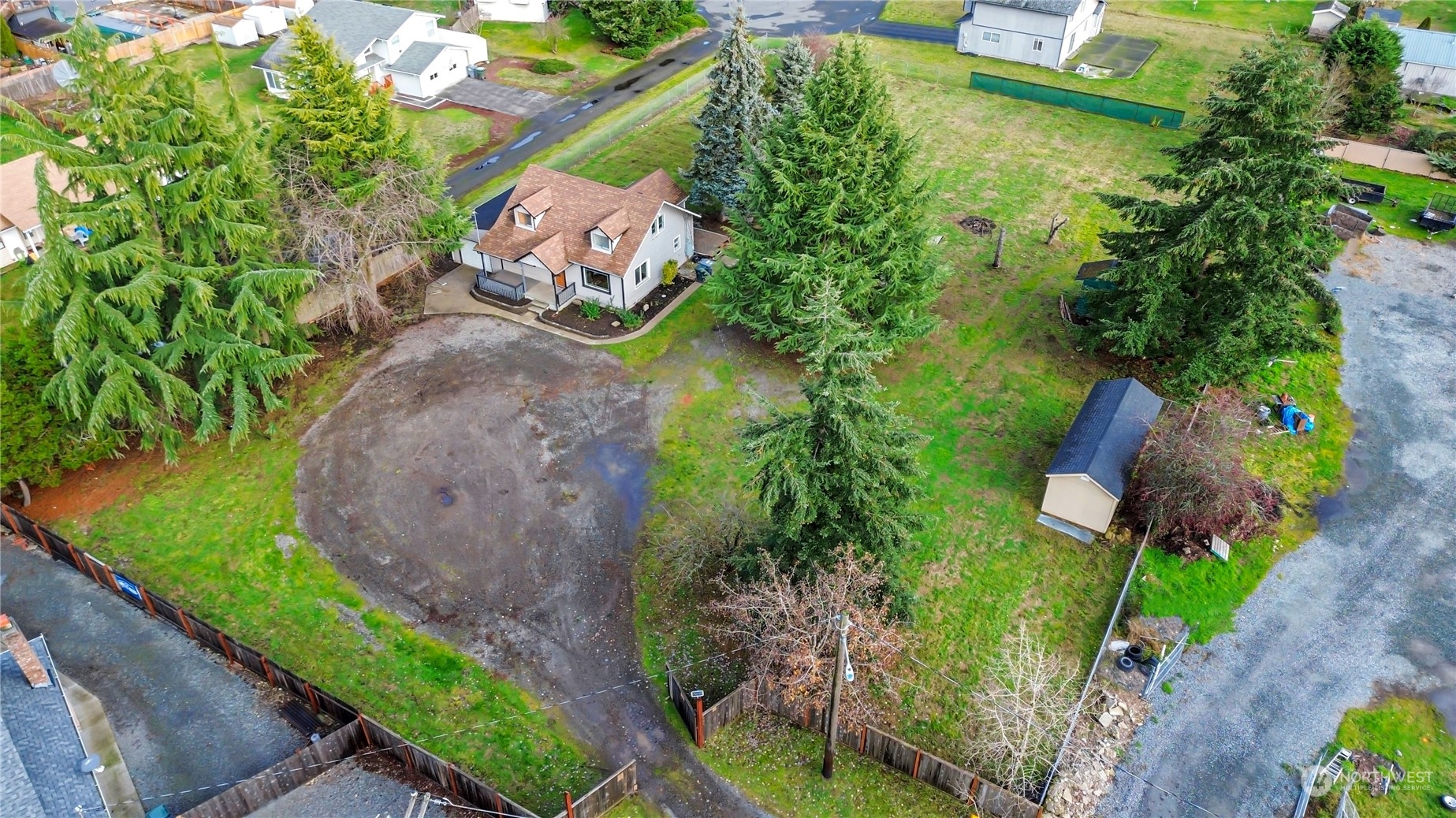 an aerial view of a house with garden