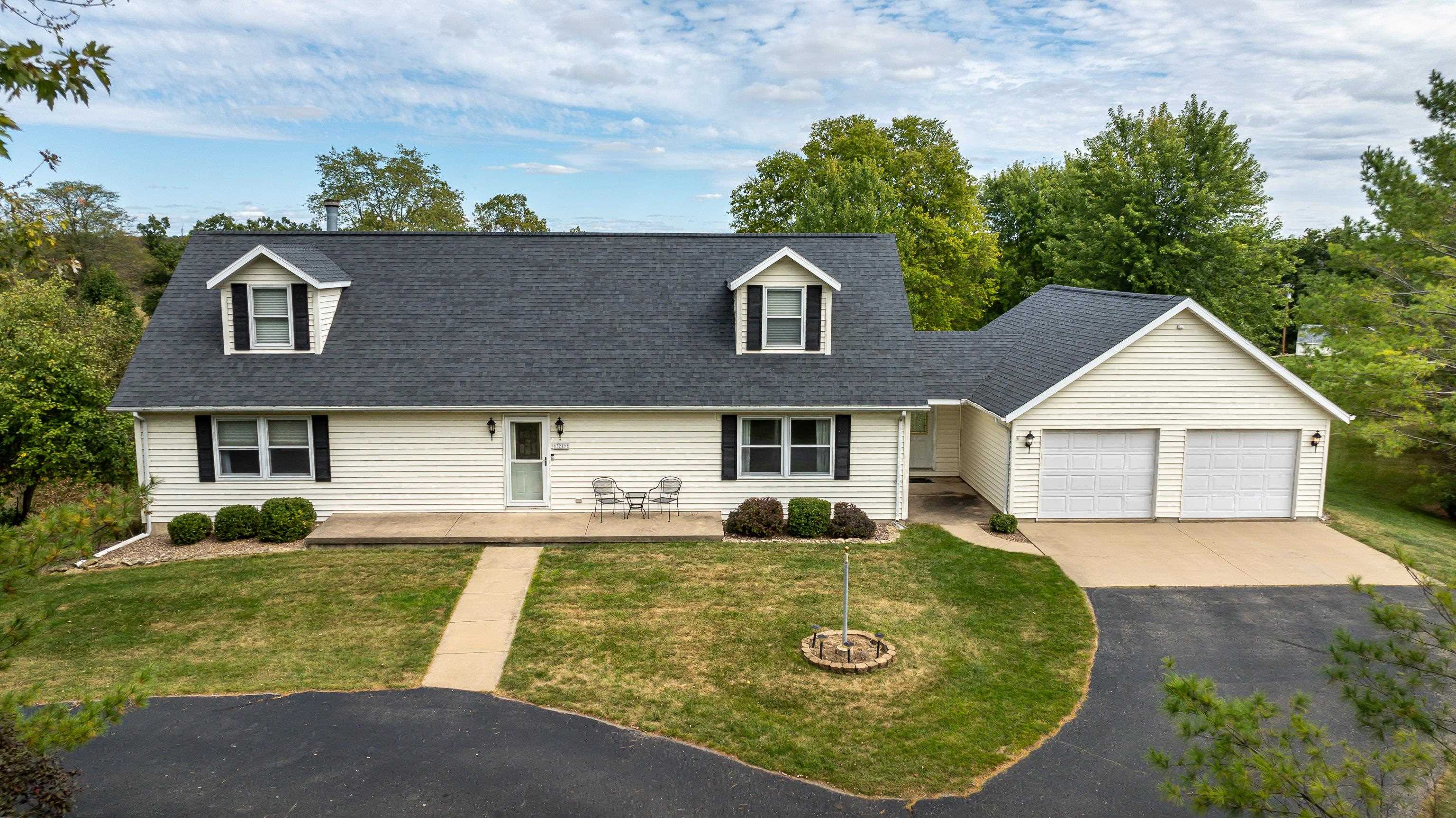 front view of a house with a yard