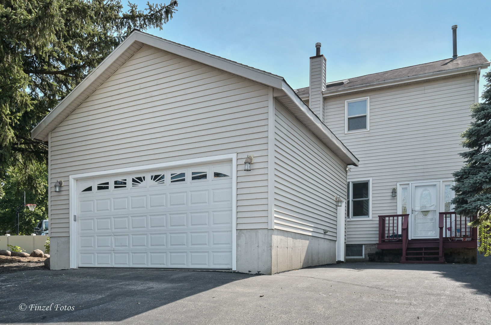 a view of a house with a garage