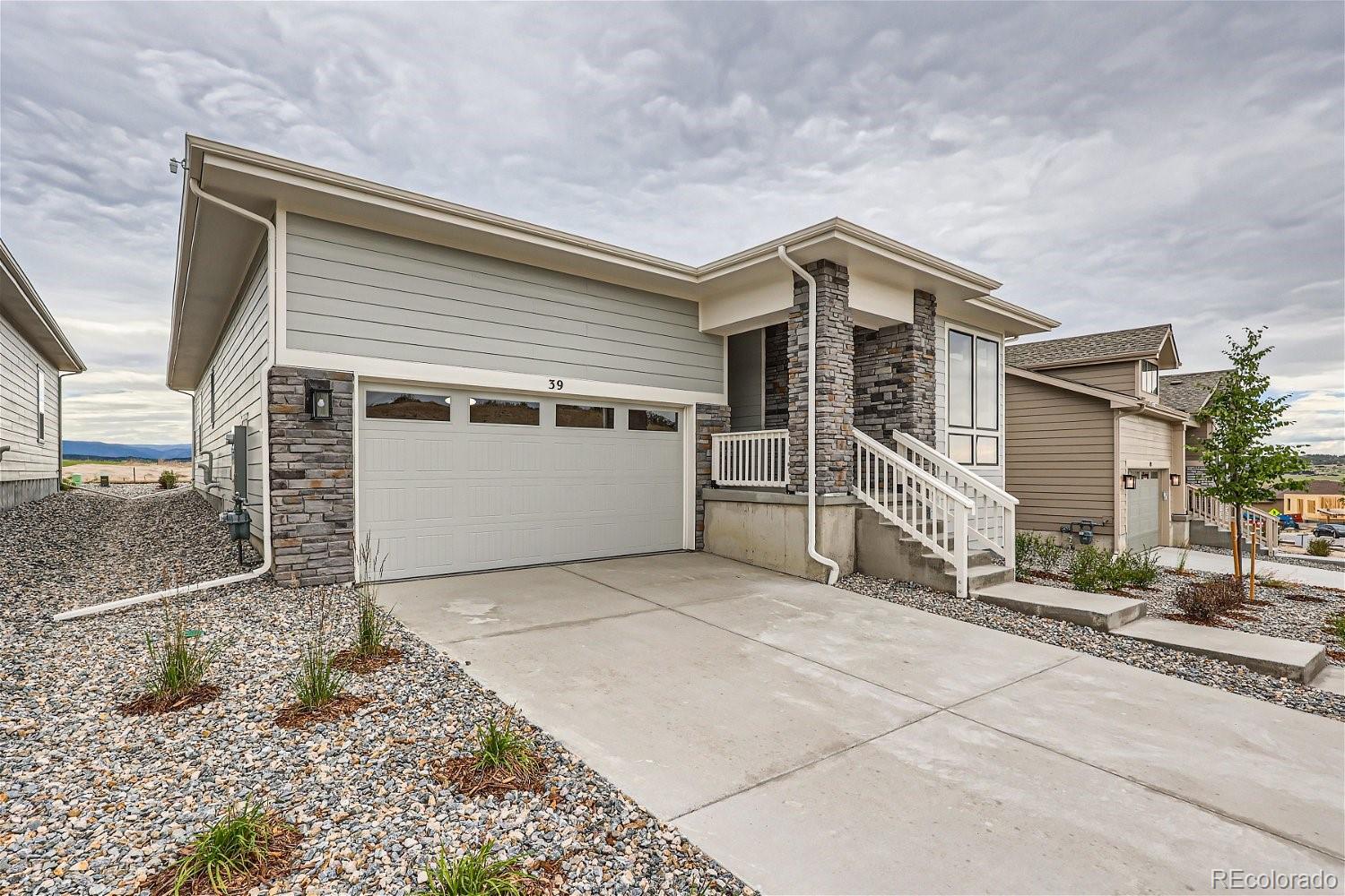 a backyard of a house with garage