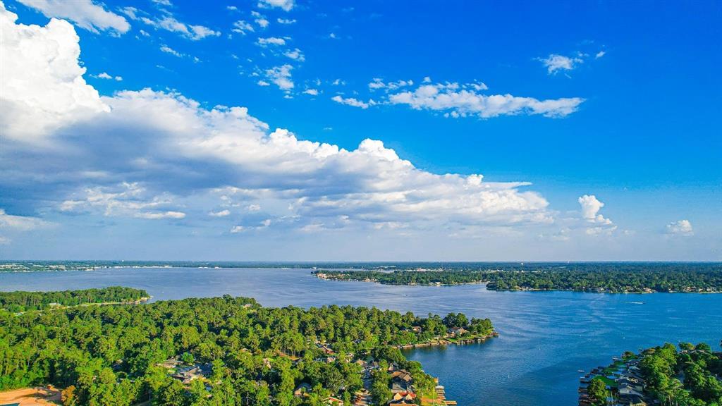 a view of a lake with a big yard