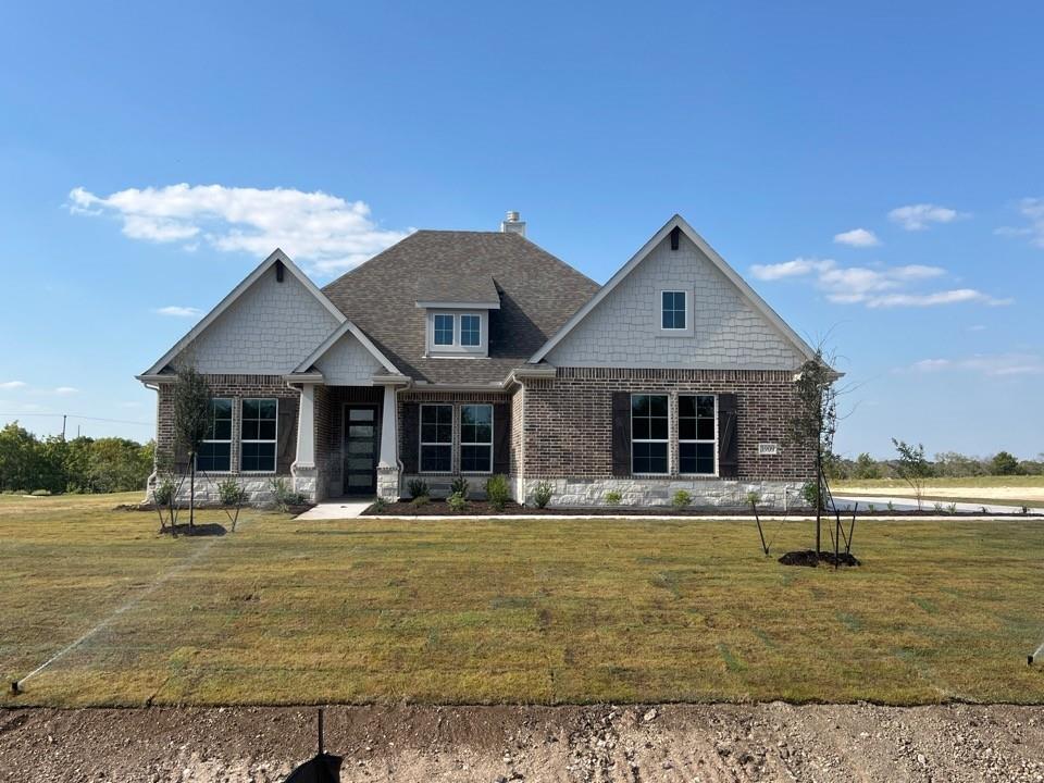 a front view of a house with swimming pool