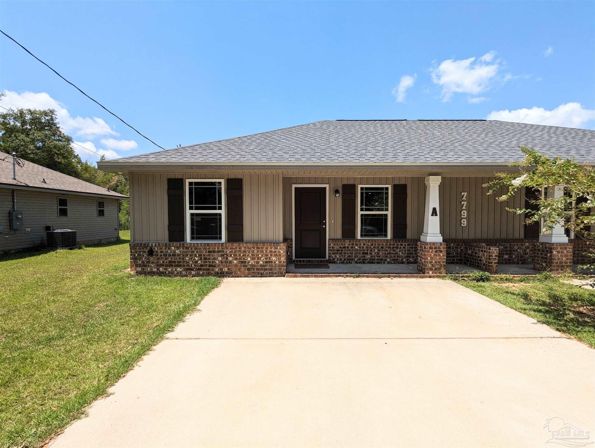 a front view of house with yard