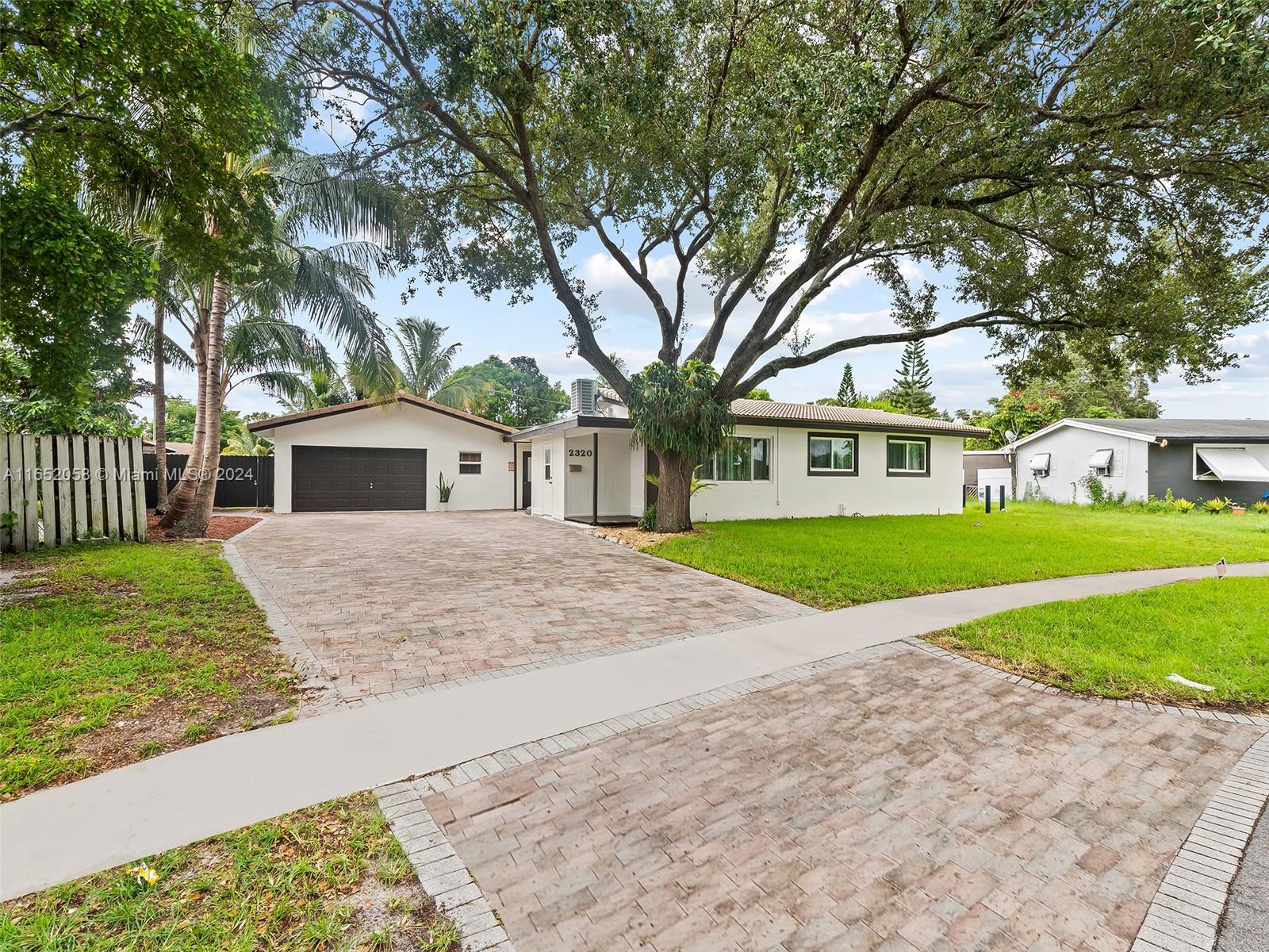 a front view of house with yard