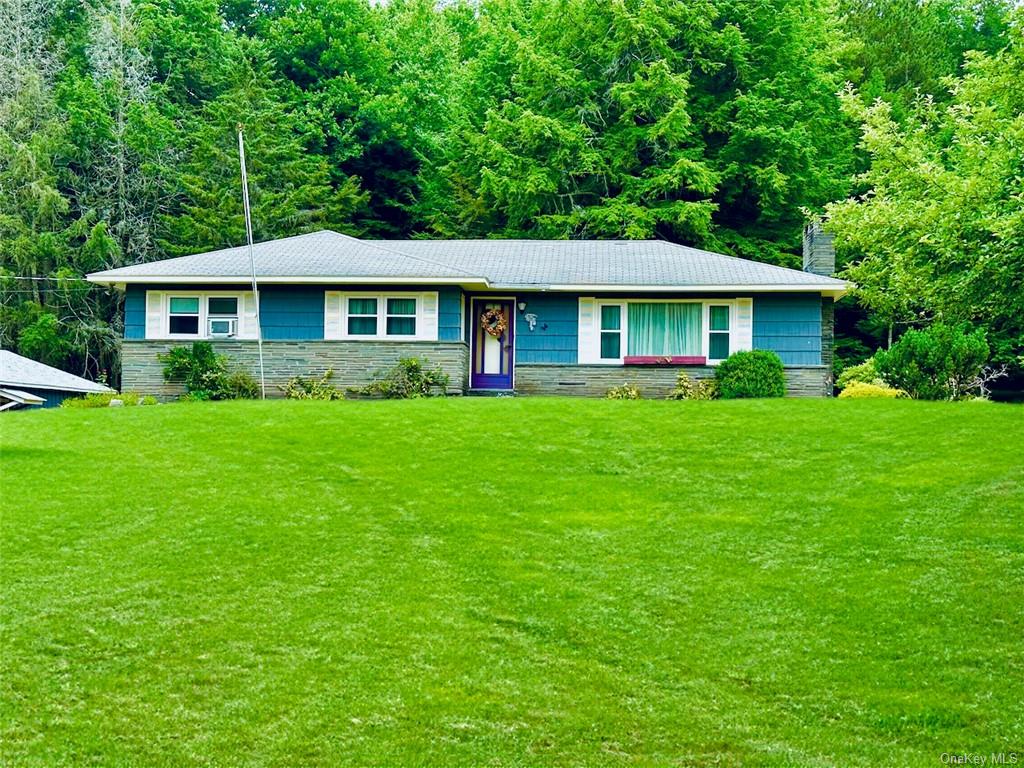 a view of a house with a garden