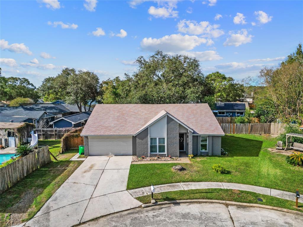 a aerial view of a house with a garden