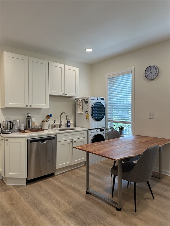 a kitchen with a table chairs and a stove