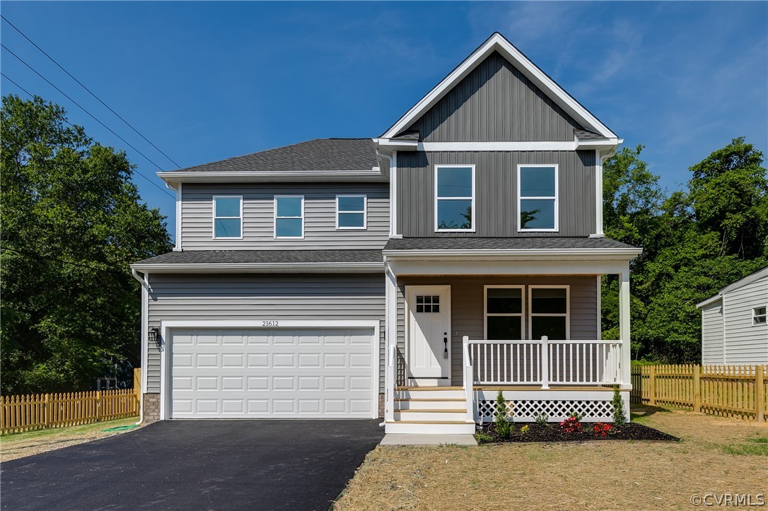 a front view of a house with a garage