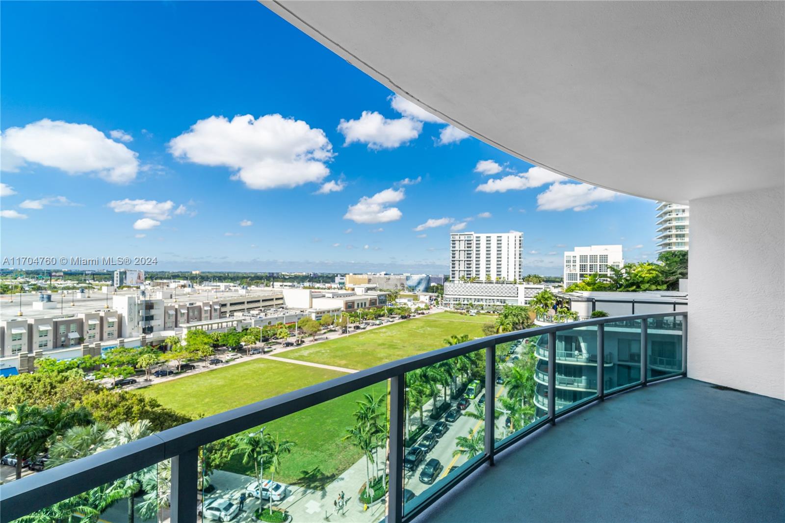 a view of a swimming pool and a balcony