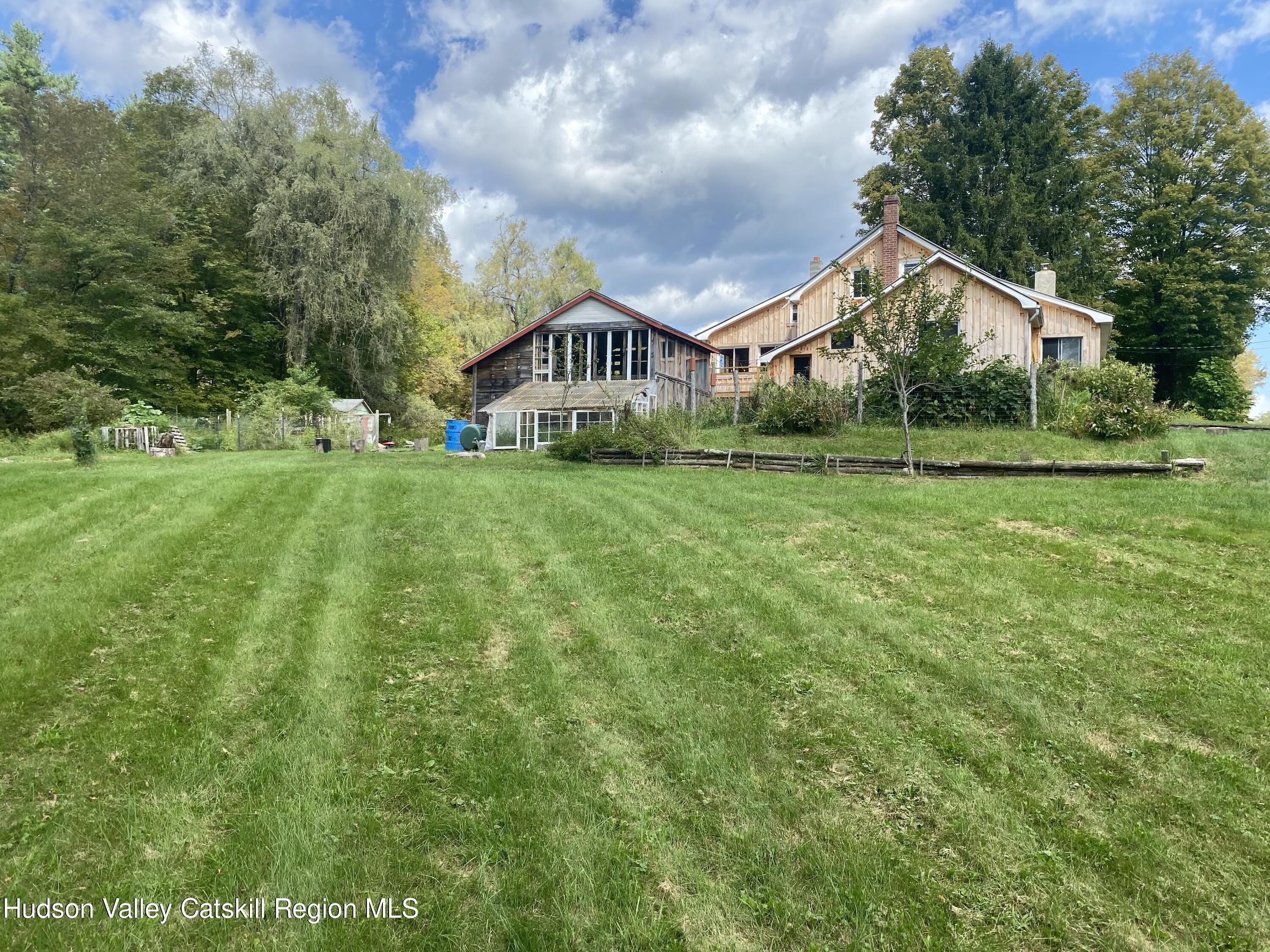 a house view with a garden space