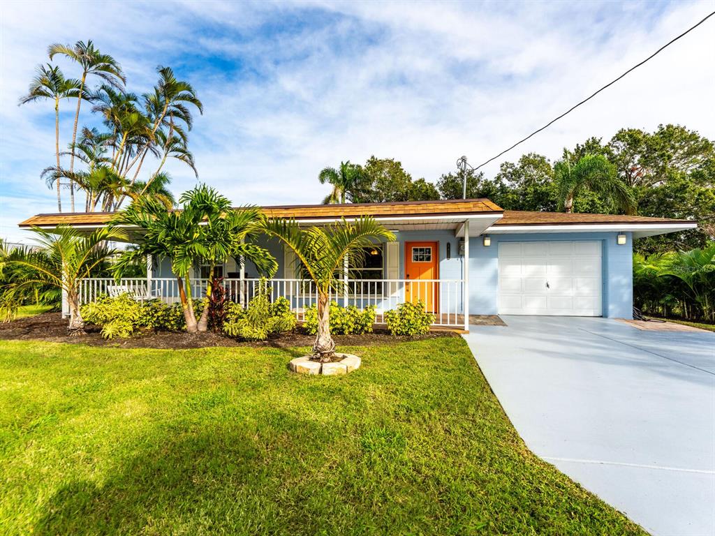 front view of a house with a big yard