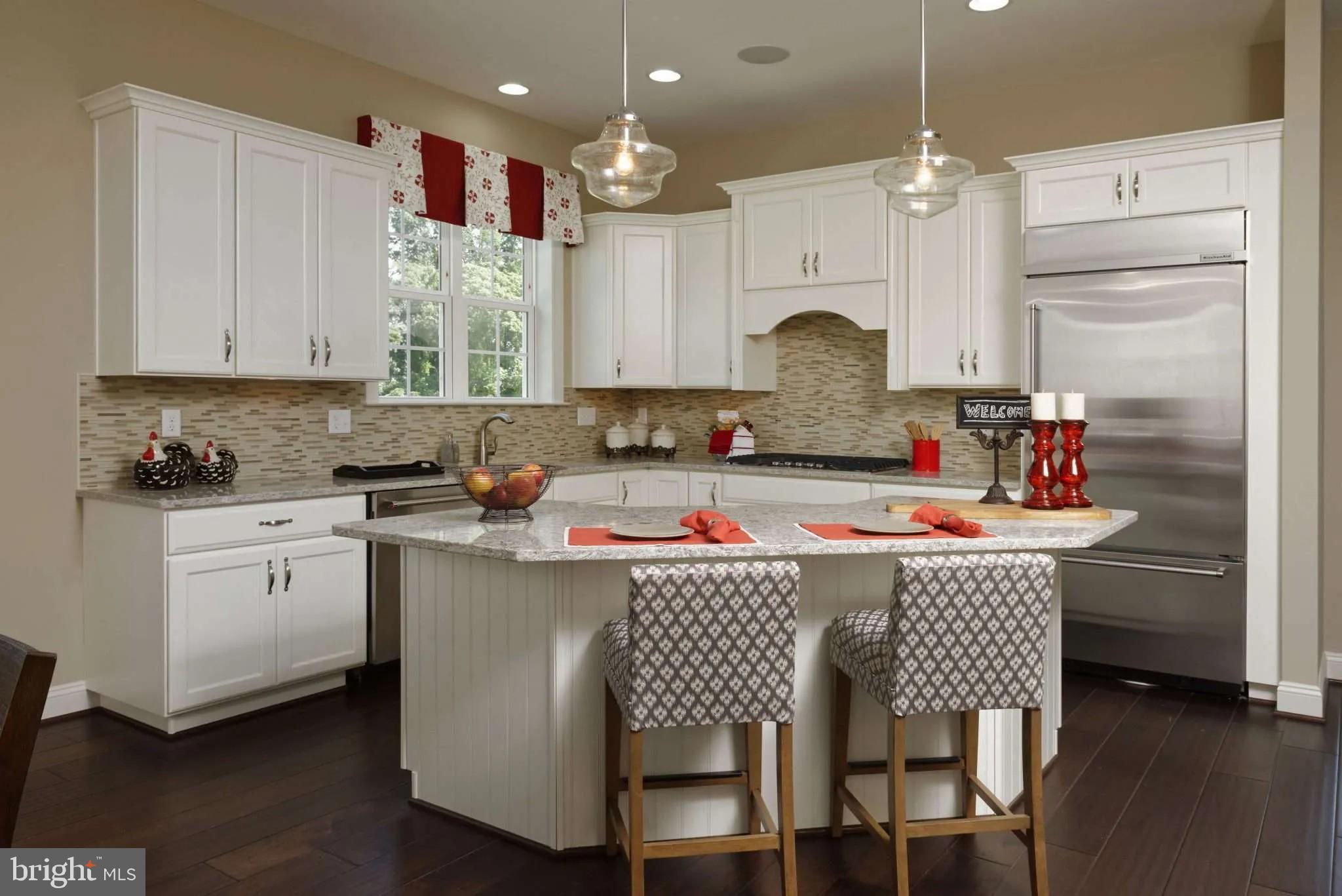 a kitchen that has a cabinets and a stove