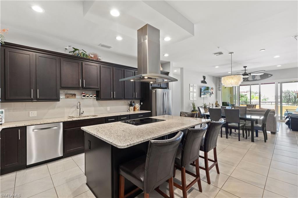 a kitchen with a table and chairs in it