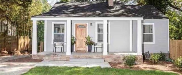 a front view of house with yard