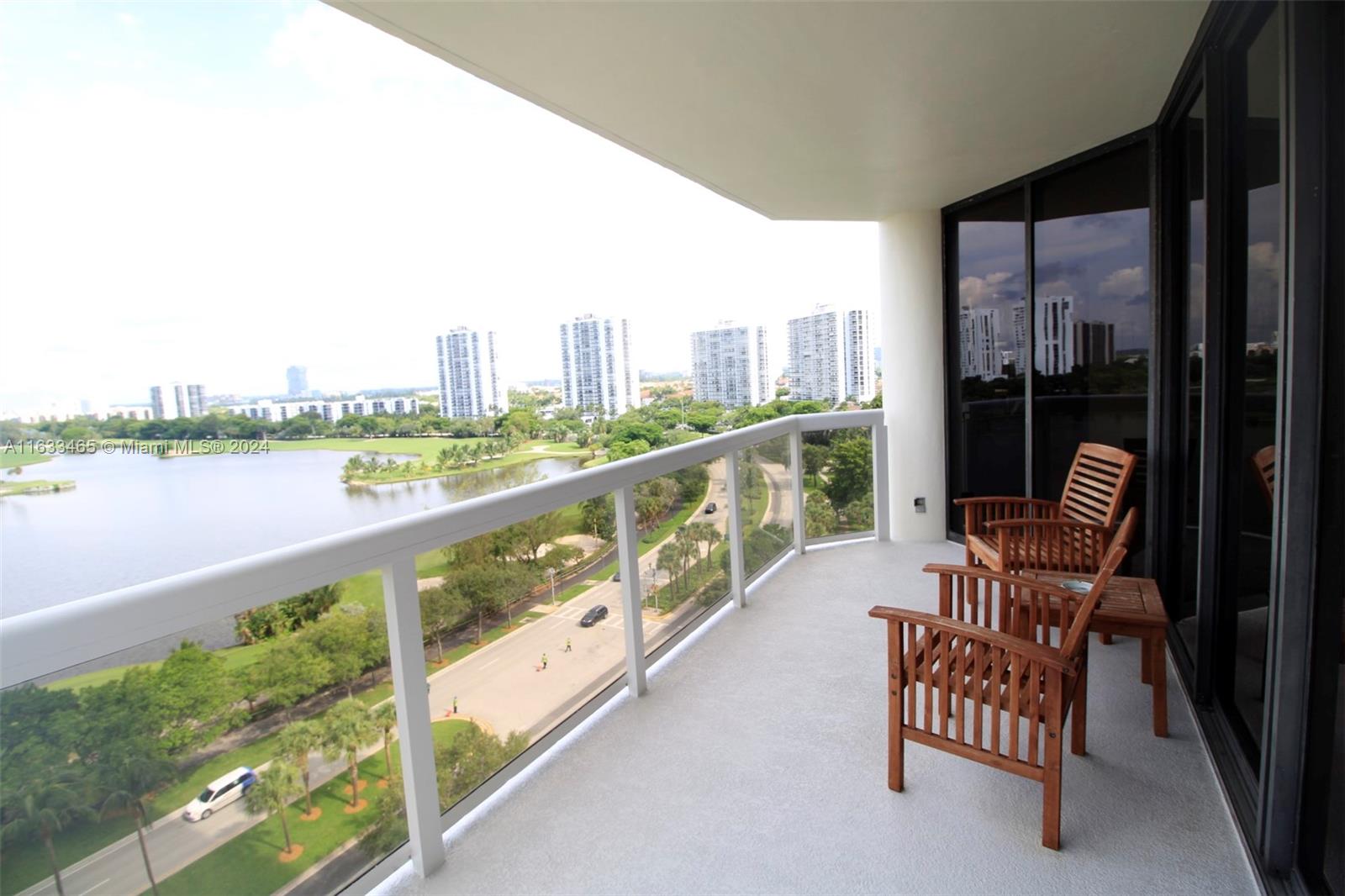 a view of a chair and table in balcony