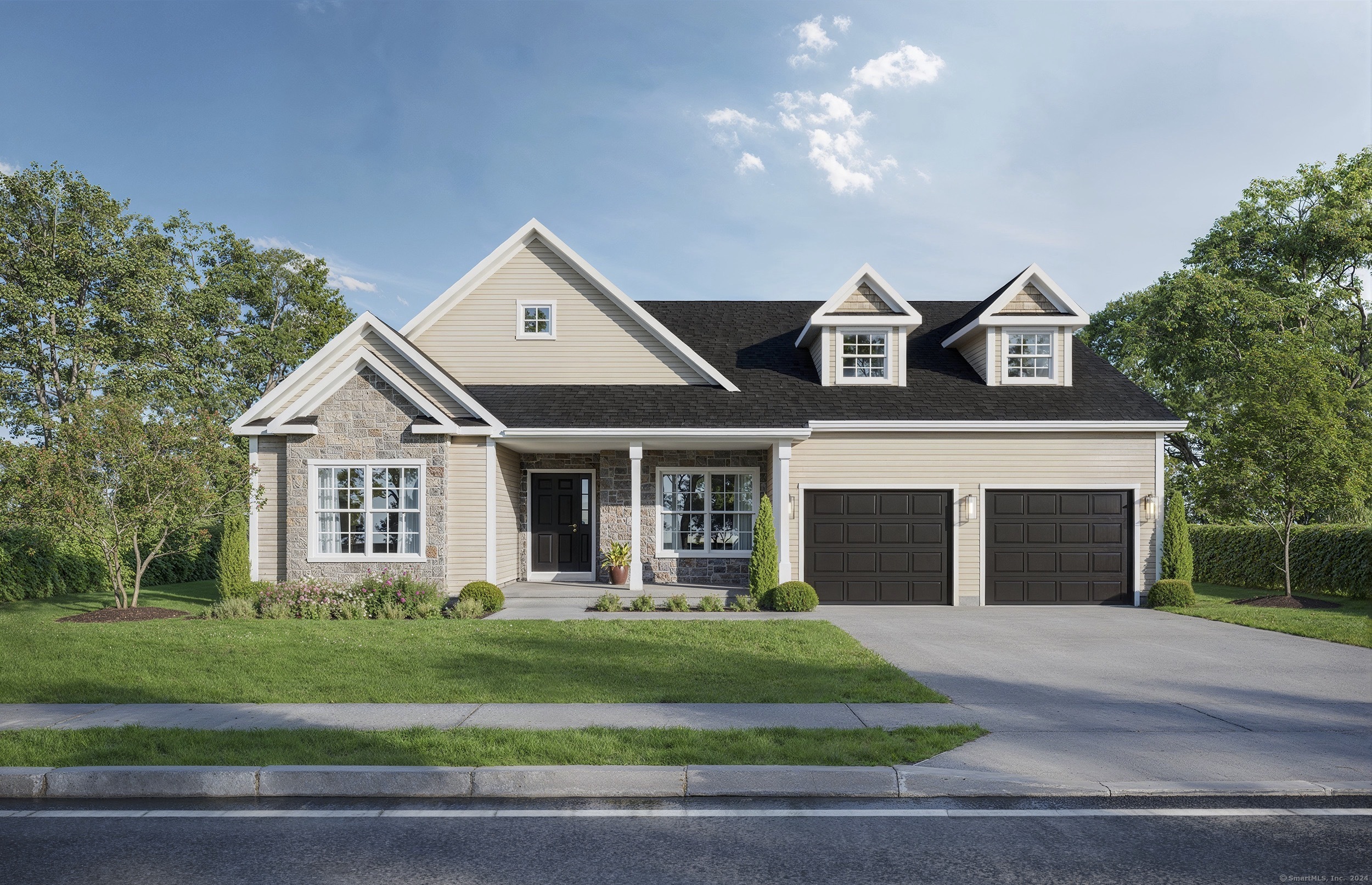 a front view of a house with a yard and garage