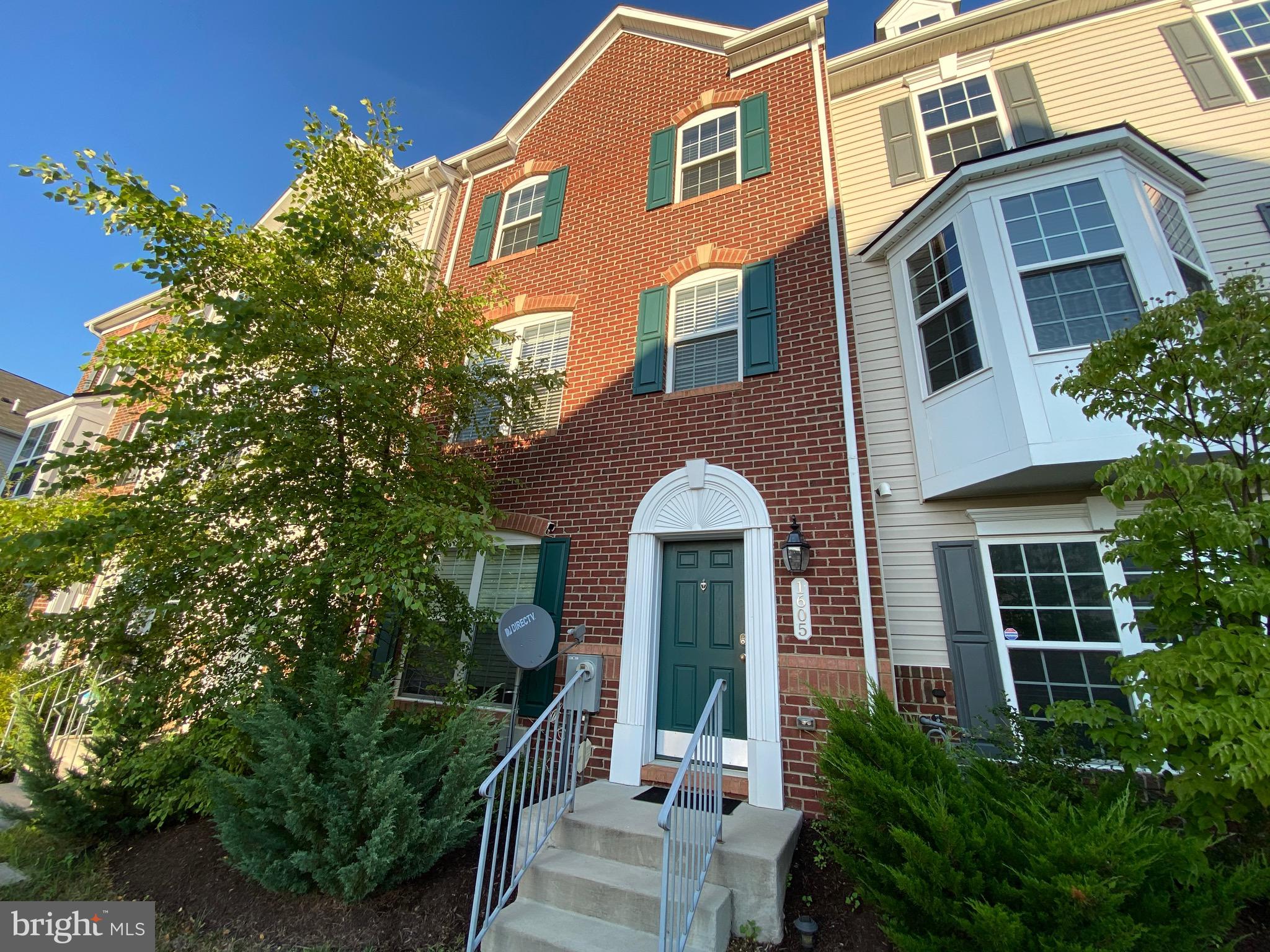 a front view of a multi story residential apartment building