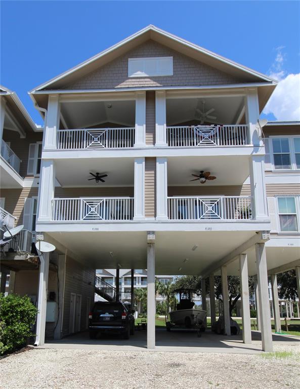 a front view of a building with parking