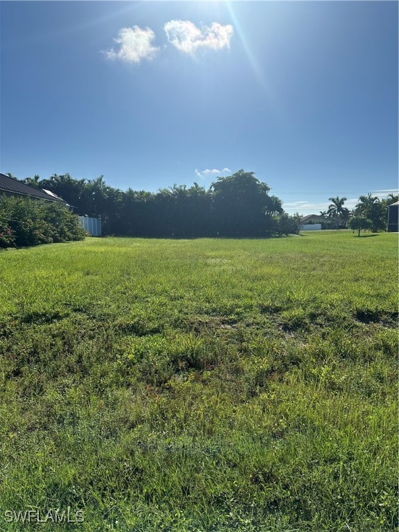 a view of an ocean and a yard