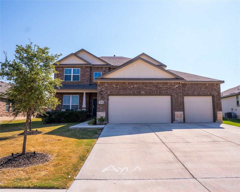 a front view of a house with yard