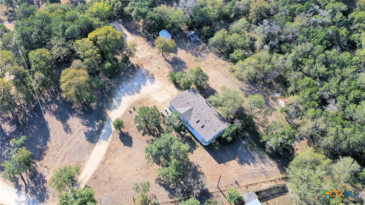 an aerial view of residential house with outdoor space