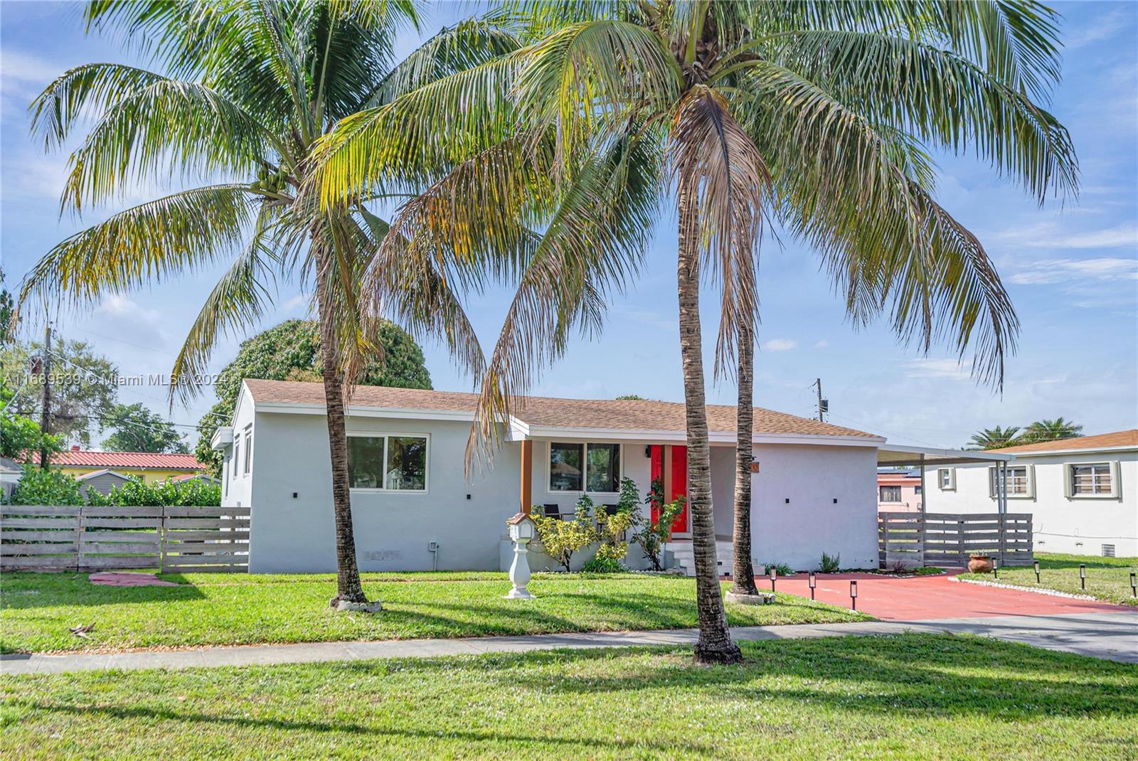 a front view of house with yard and entertaining space