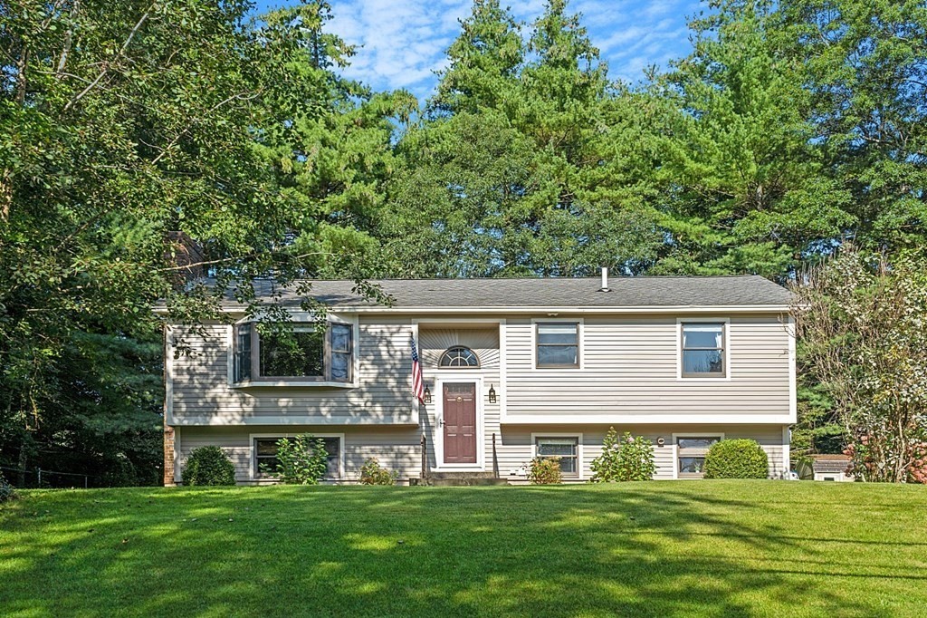 a front view of house with yard