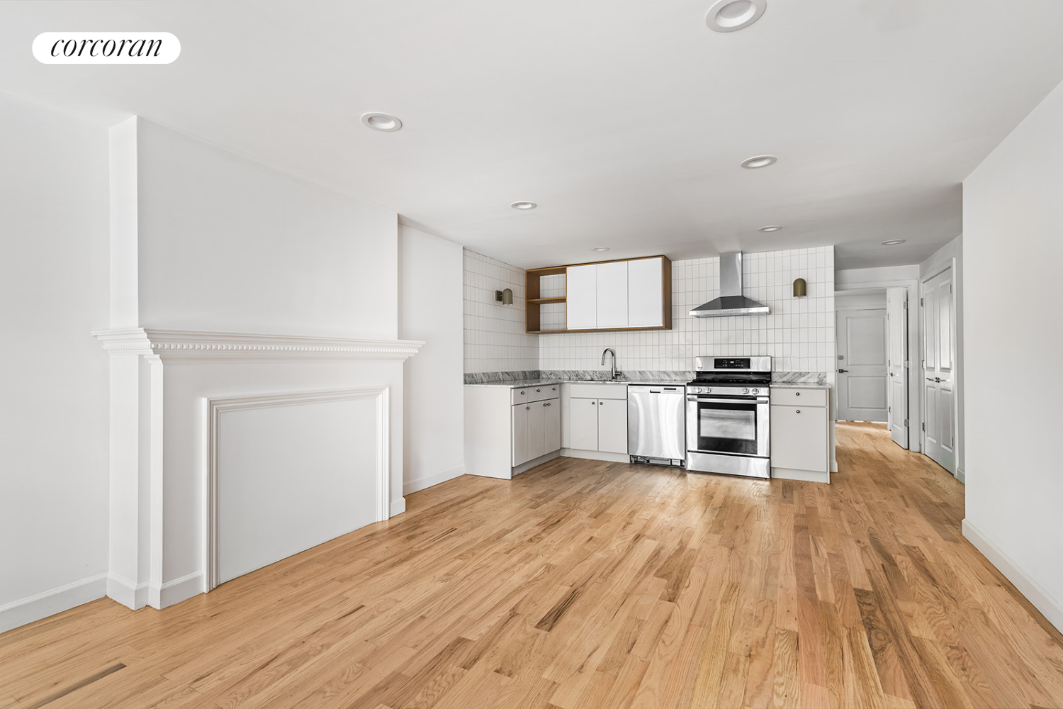 a kitchen with stainless steel appliances a refrigerator and cabinets