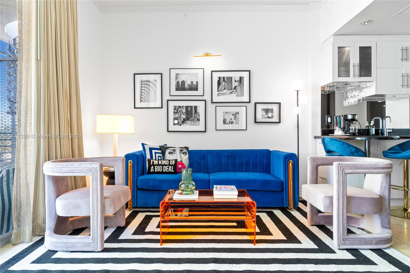 a living room with furniture and a table