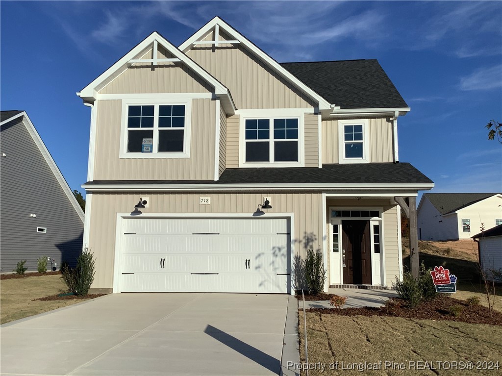 a view of a house with a garage