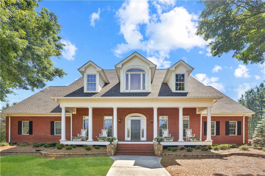 front view of a house with a yard