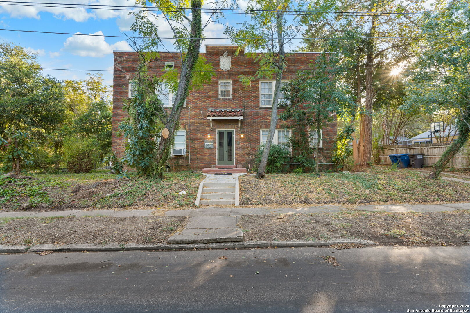 front view of a house with a yard