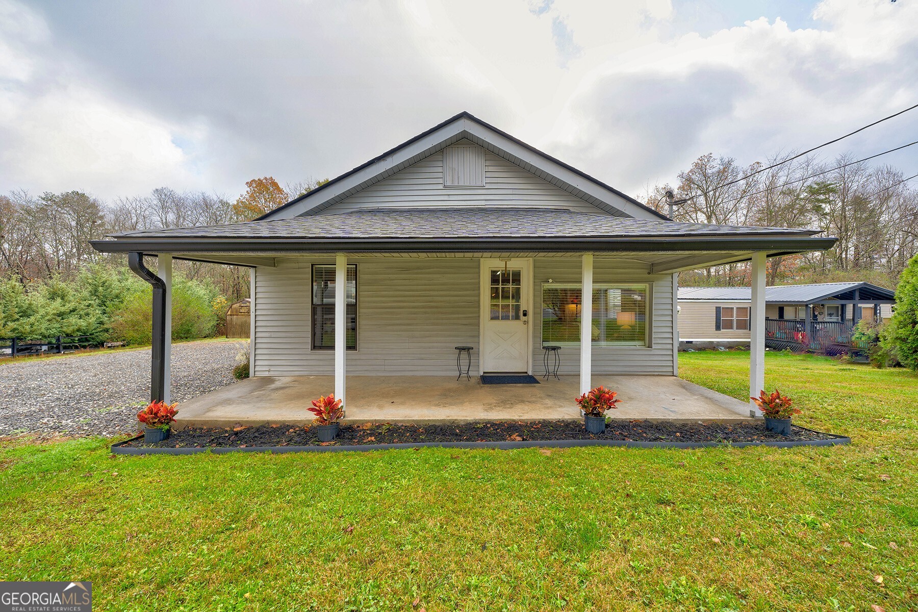 front view of a house with a yard