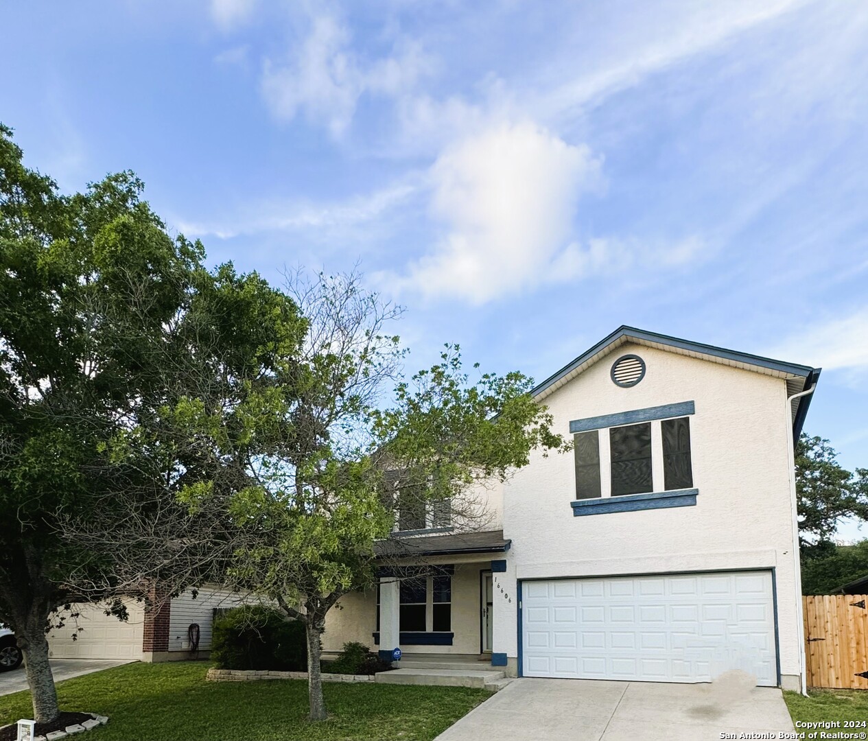 front view of house with a yard