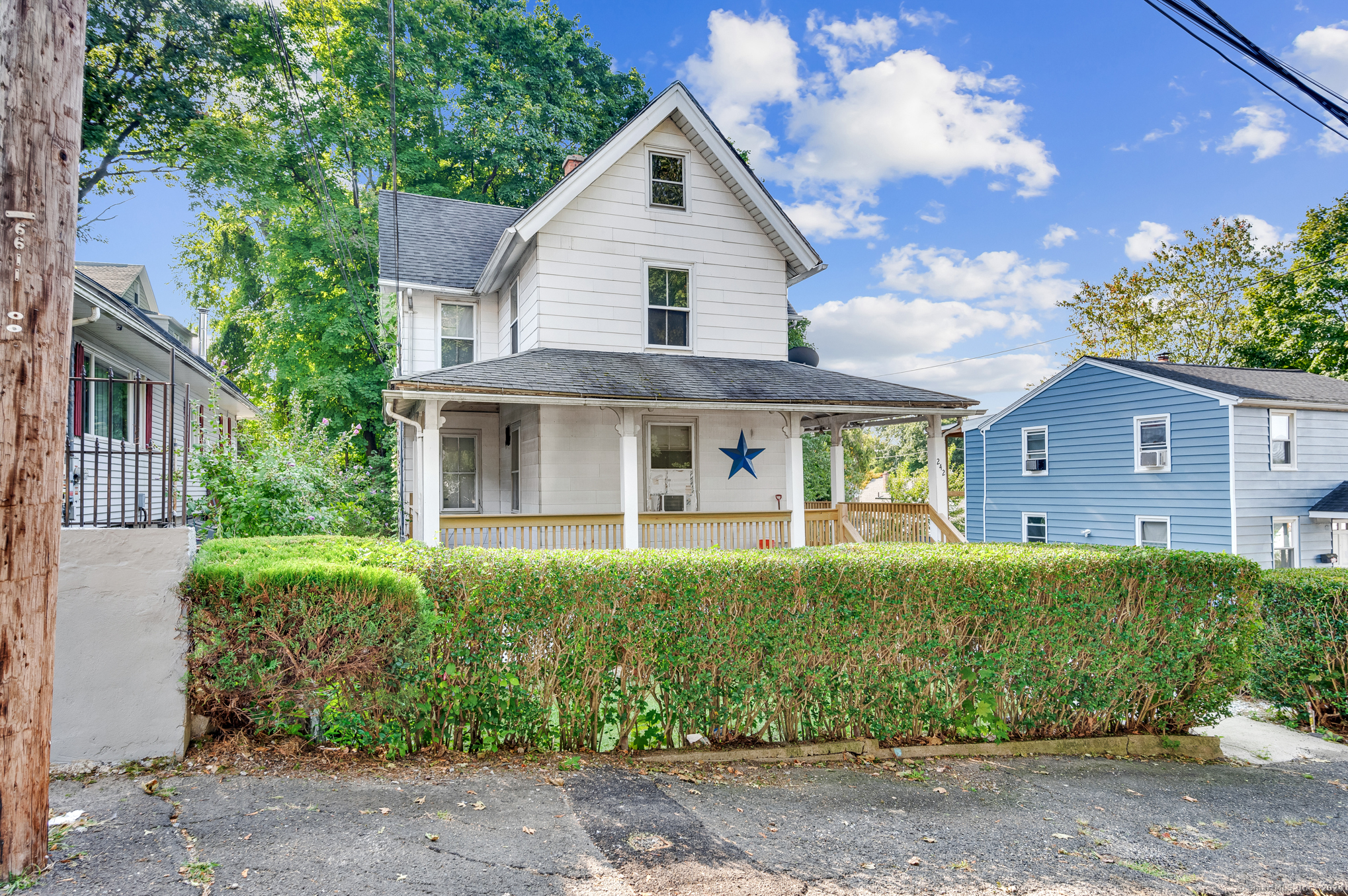 front view of a house with a yard