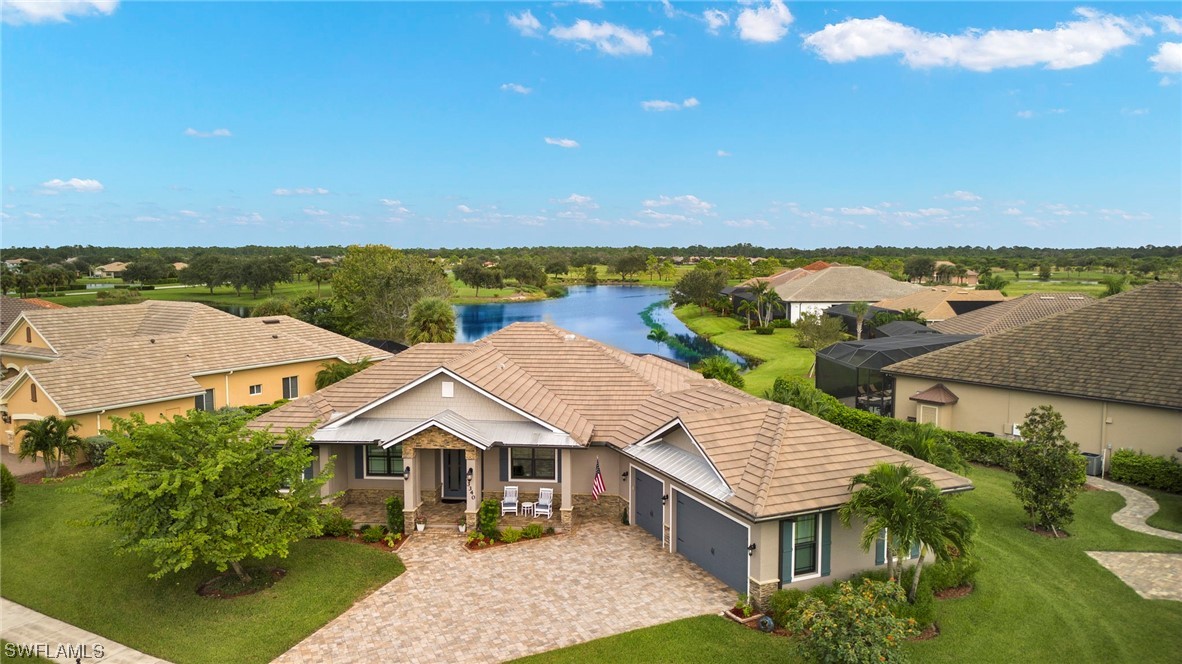 an aerial view of a house with a garden