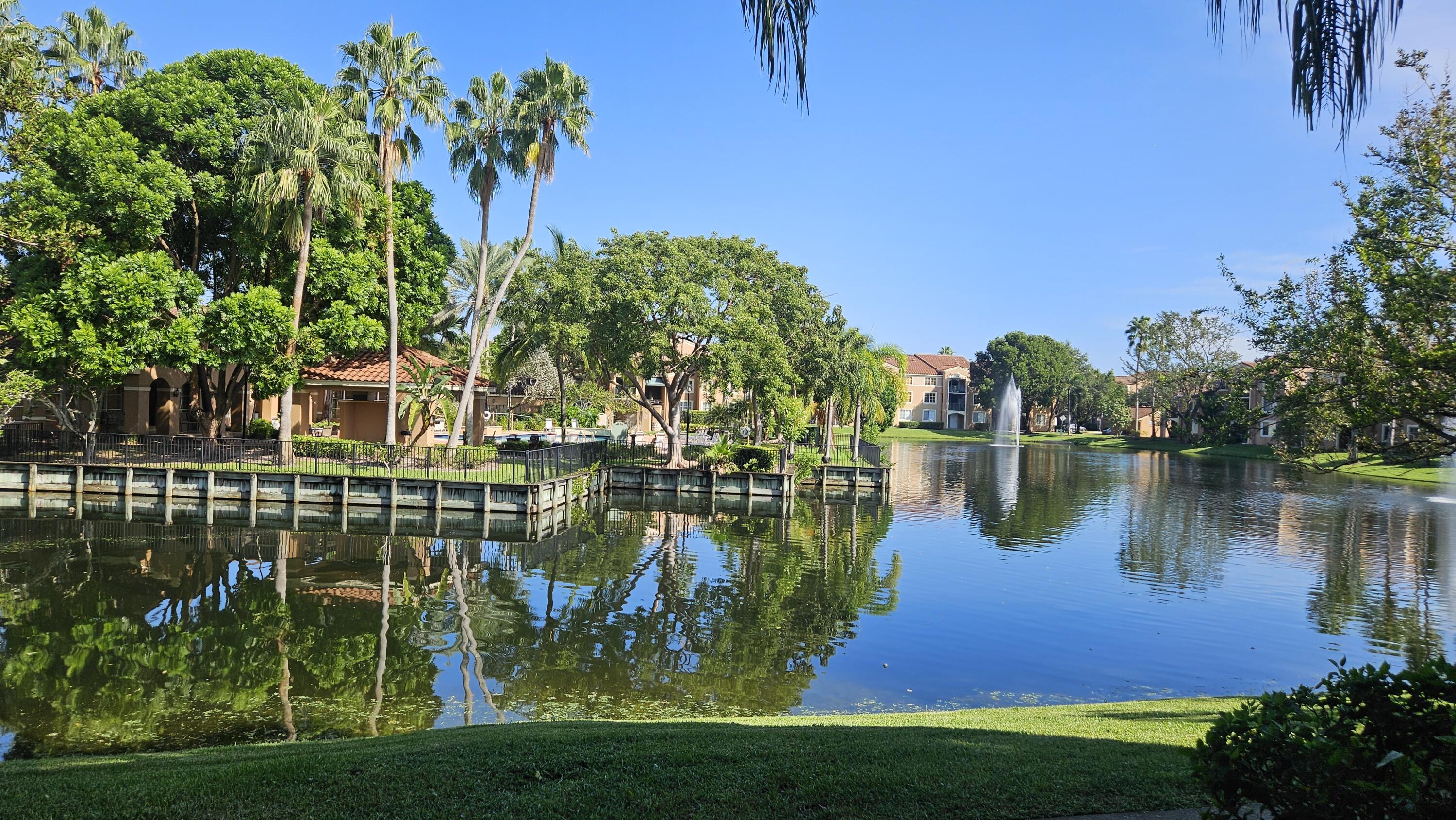 a view of a lake with a garden