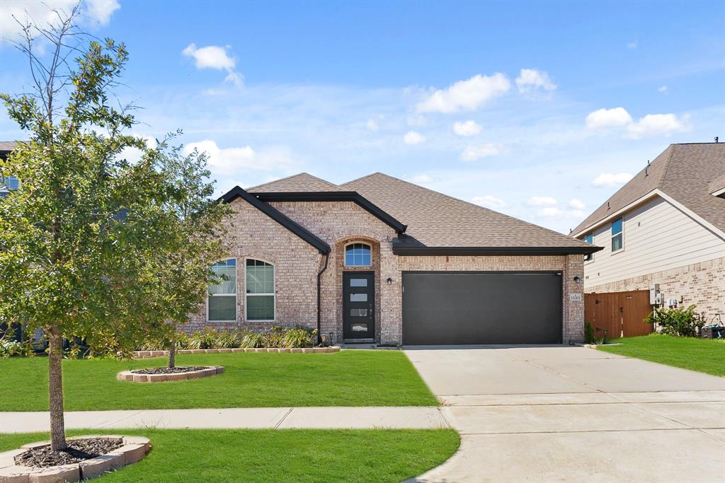 Beautiful front view with brick exterior