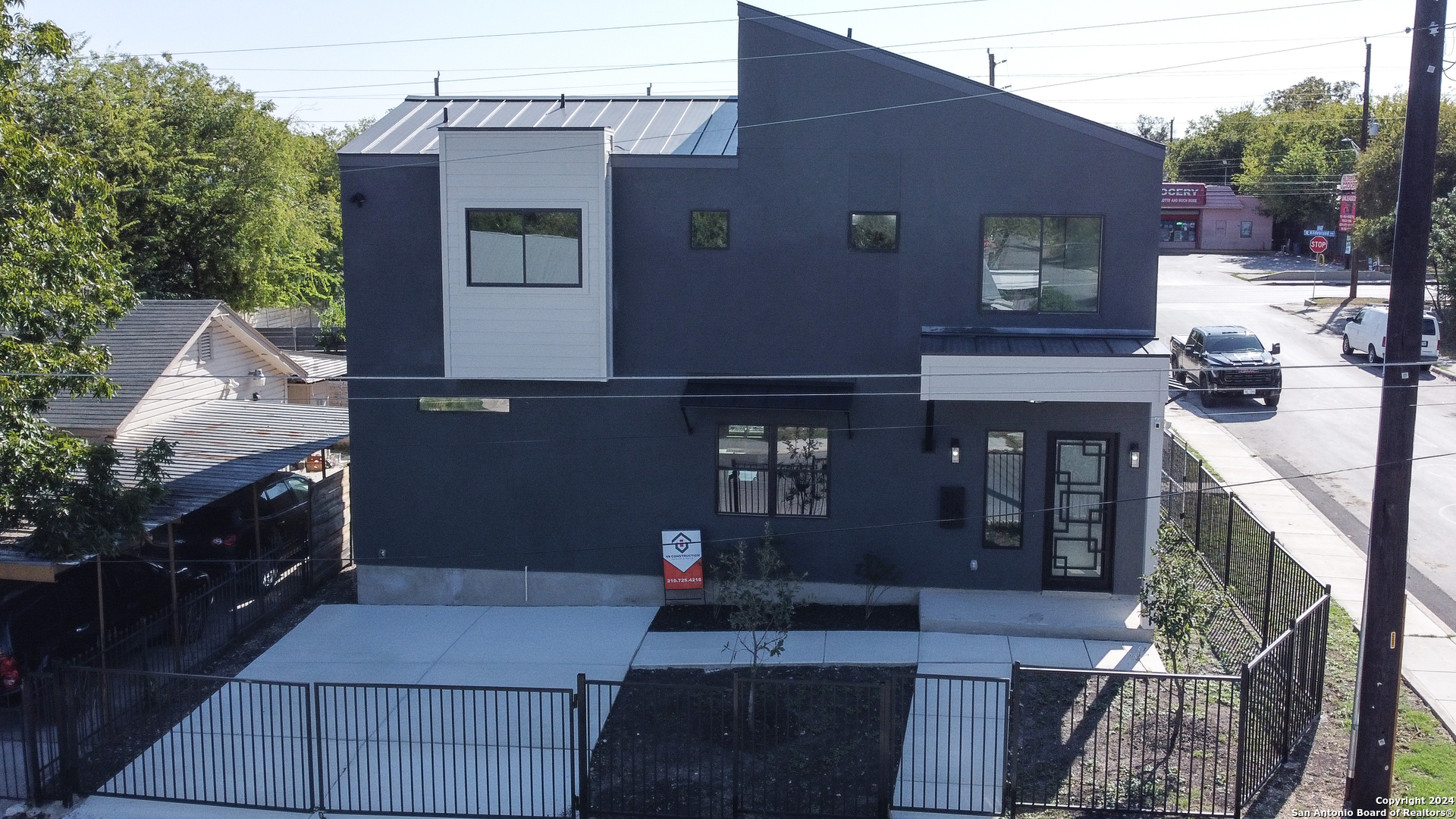 a front view of a house with yard