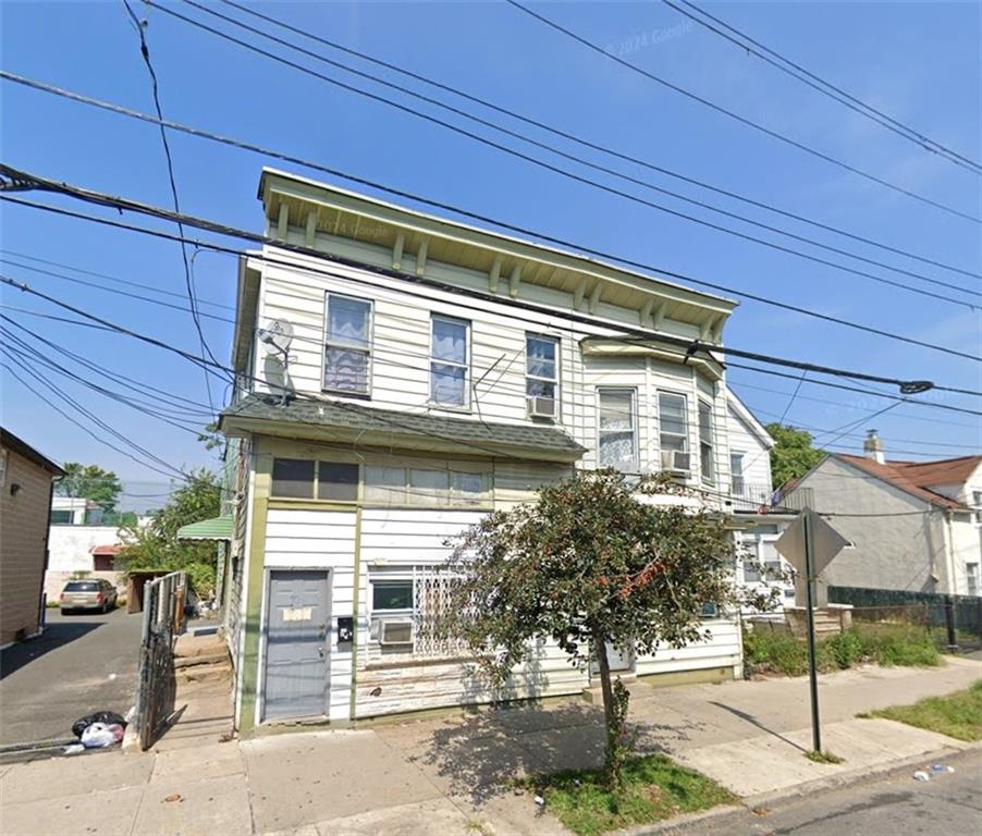 a view of a house with a patio