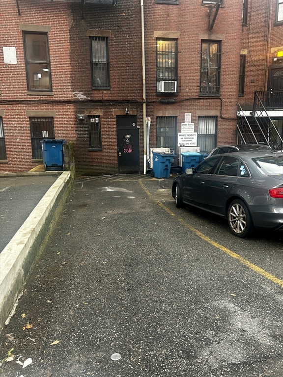 a car parked in front of a building