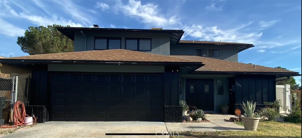 a house view with a outdoor space