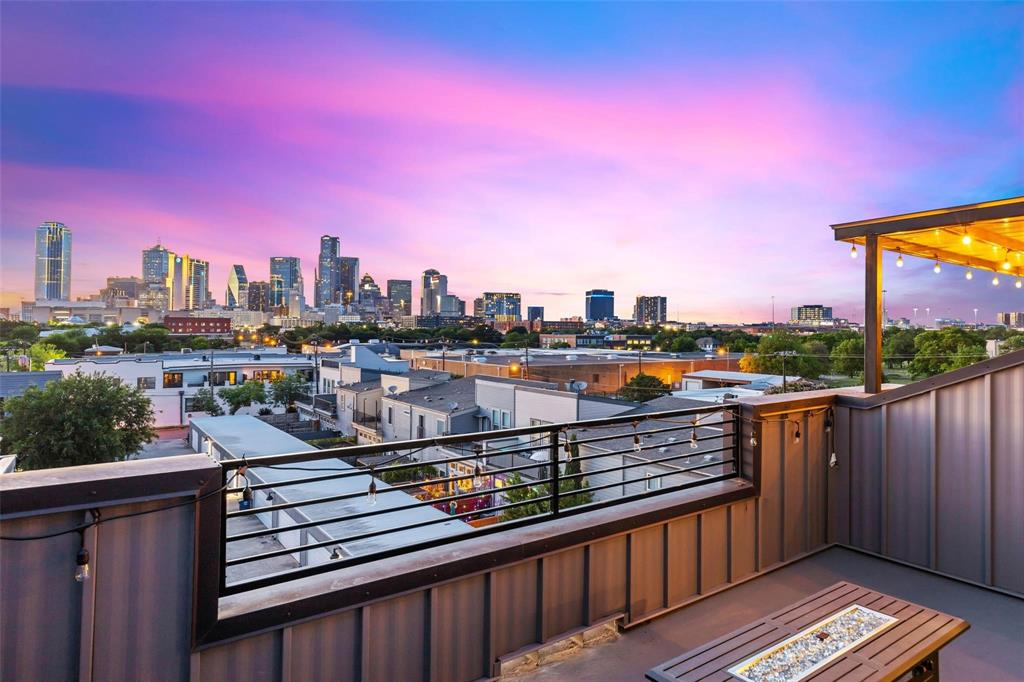 a view of a balcony with city view