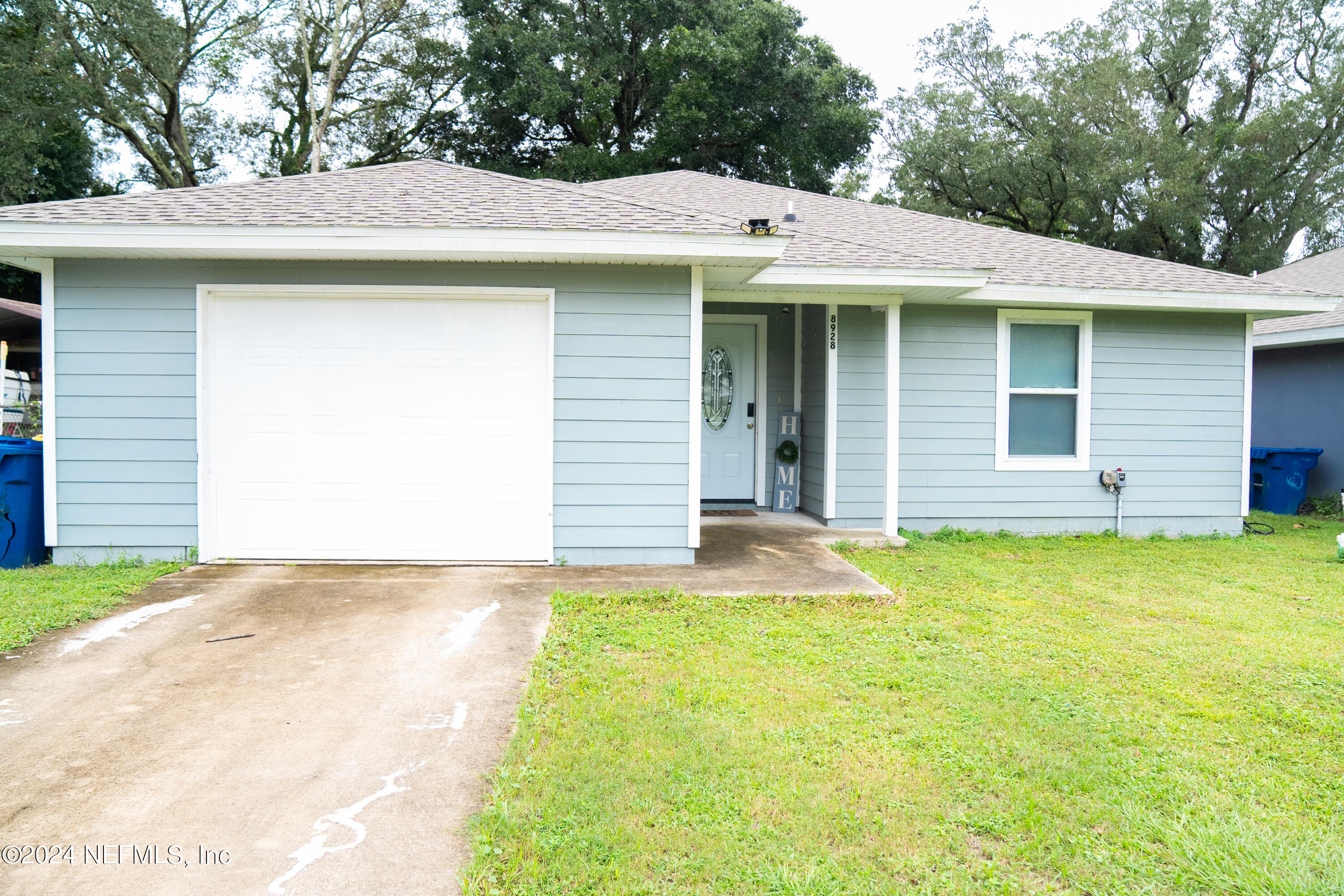 front view of a house with a yard