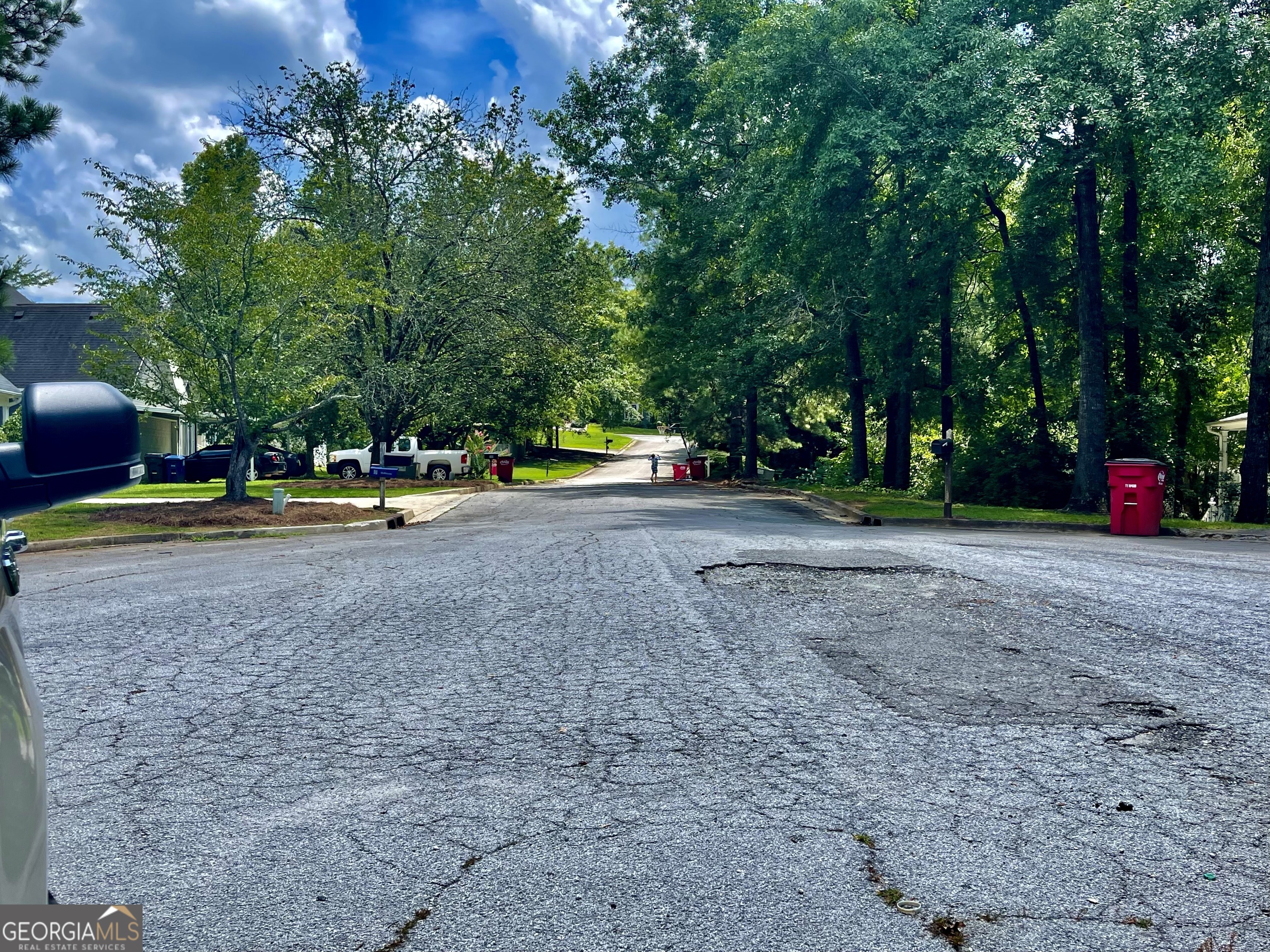 a view of road with trees