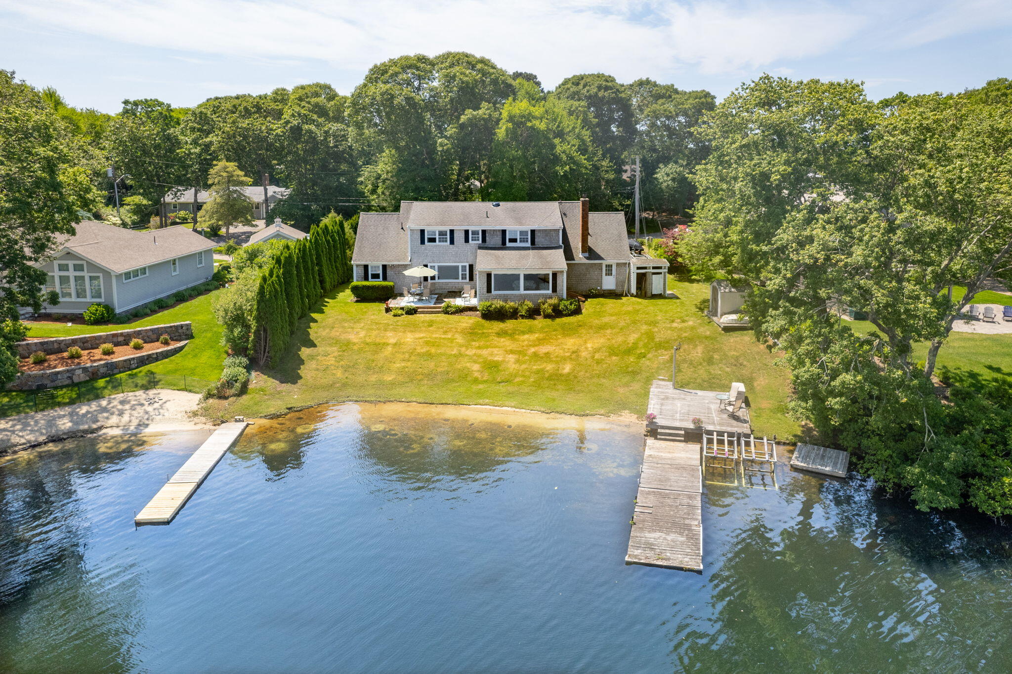 a view of a swimming pool with a yard