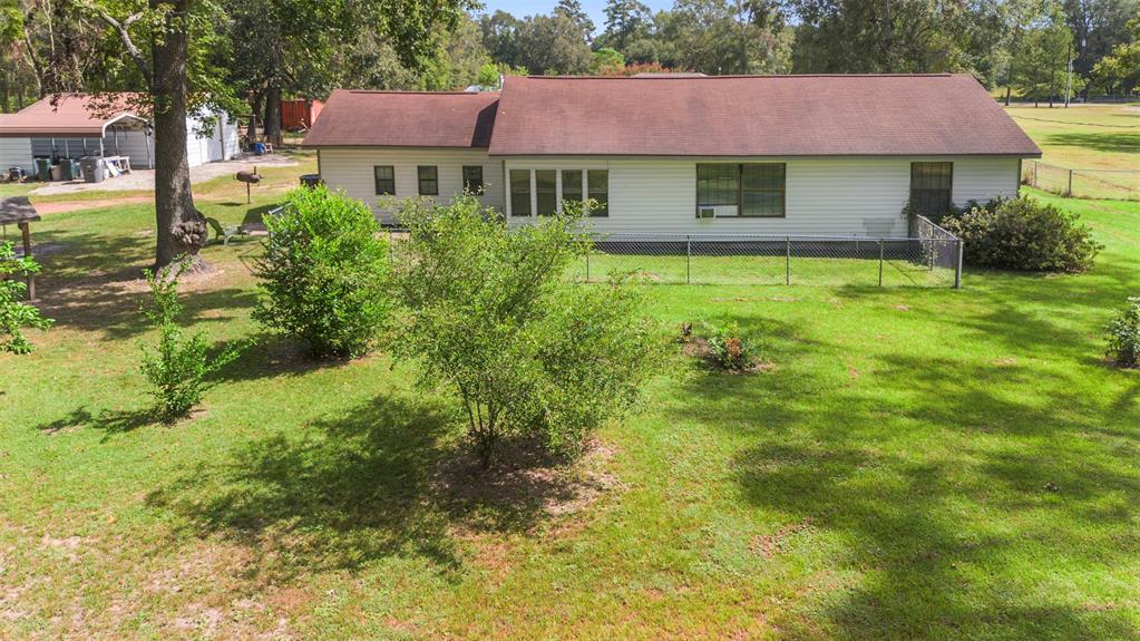 a view of a house with a garden